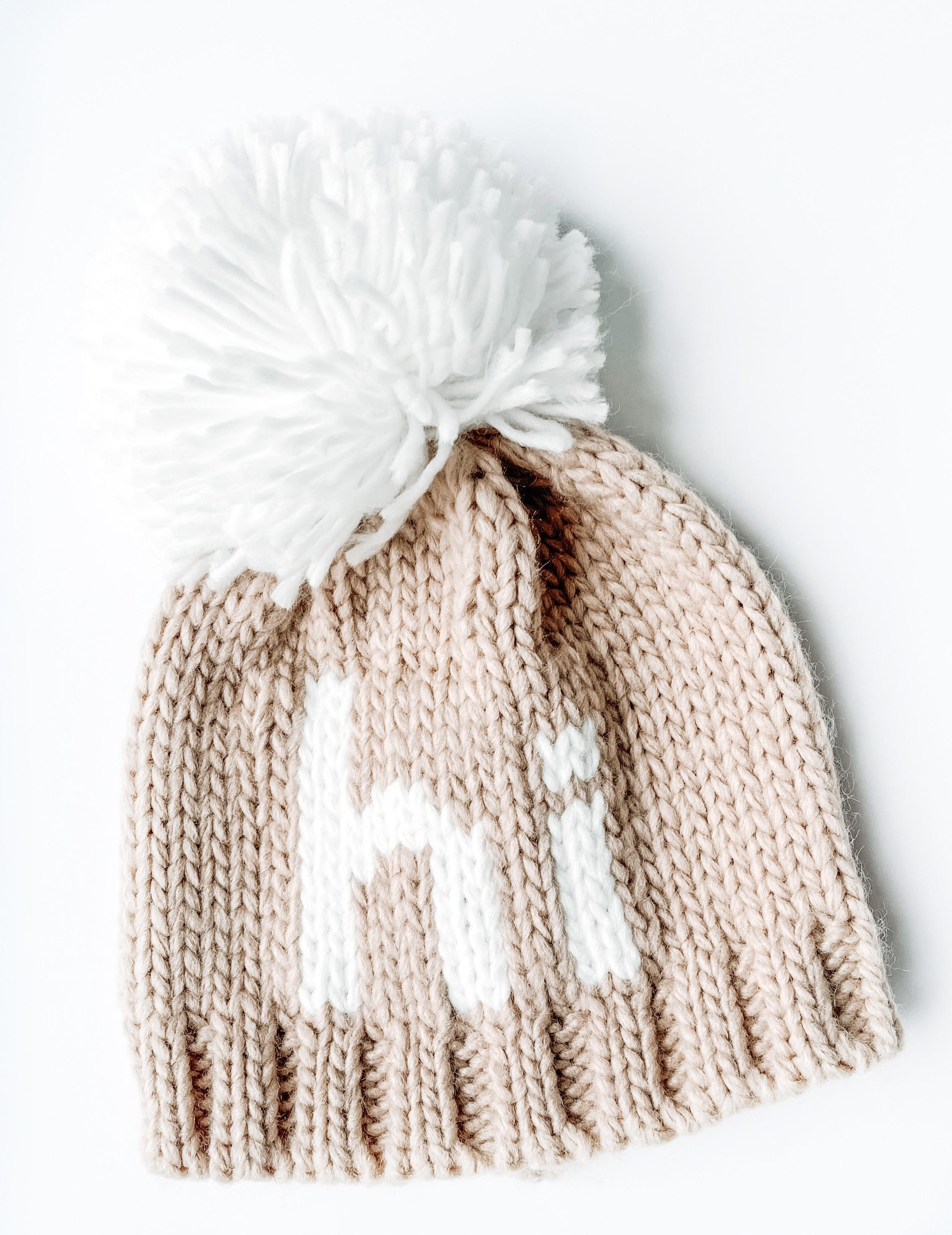 Kids Hi Knit Beanie - Tan - has white pom top and "hi" is in white