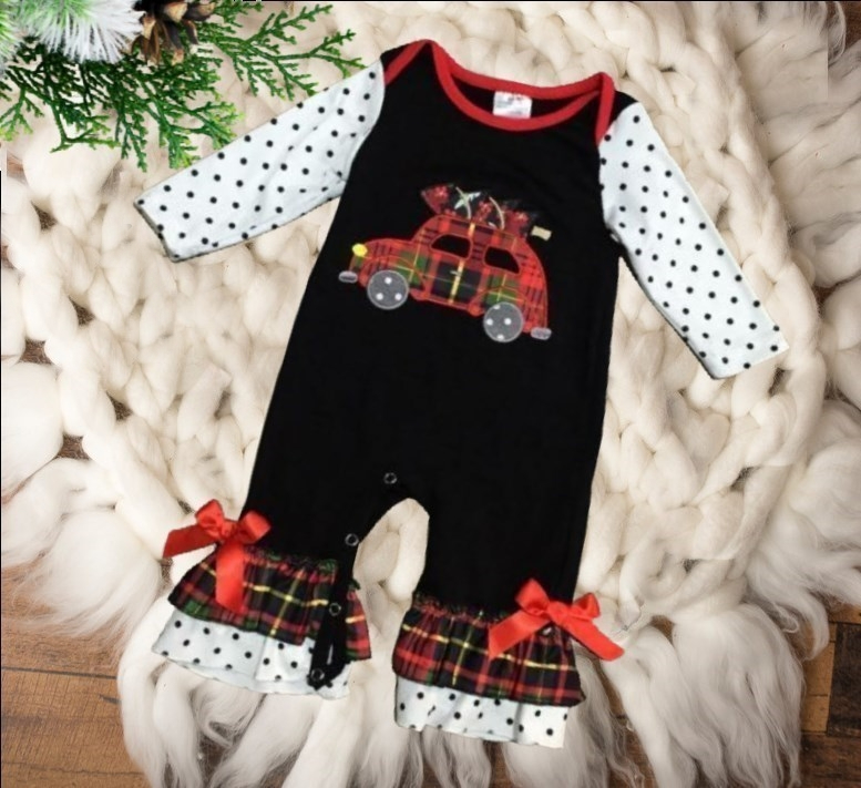 Baby & Toddler Ruffled Romper Jumpsuits - Black & White Polka Dot - Car. The bodice is black with a red plaid car transporting a tree. Sleeves are white with black polka dots, and that is also on the feet area with red plaid ruffle & red bows.