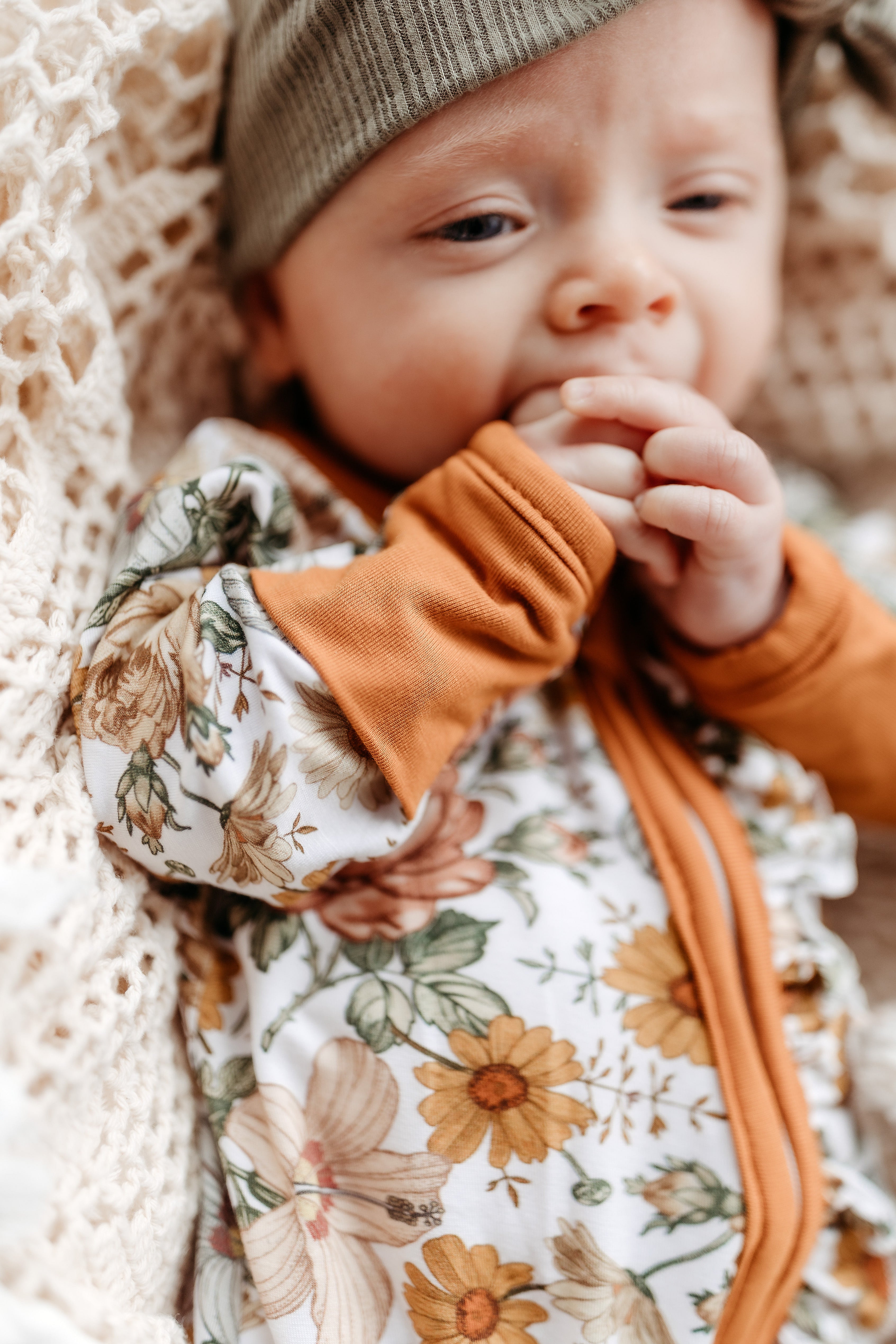 Neutral Printed Bamboo Ruffle Zippies - Floral Melody - showing hand cuffs