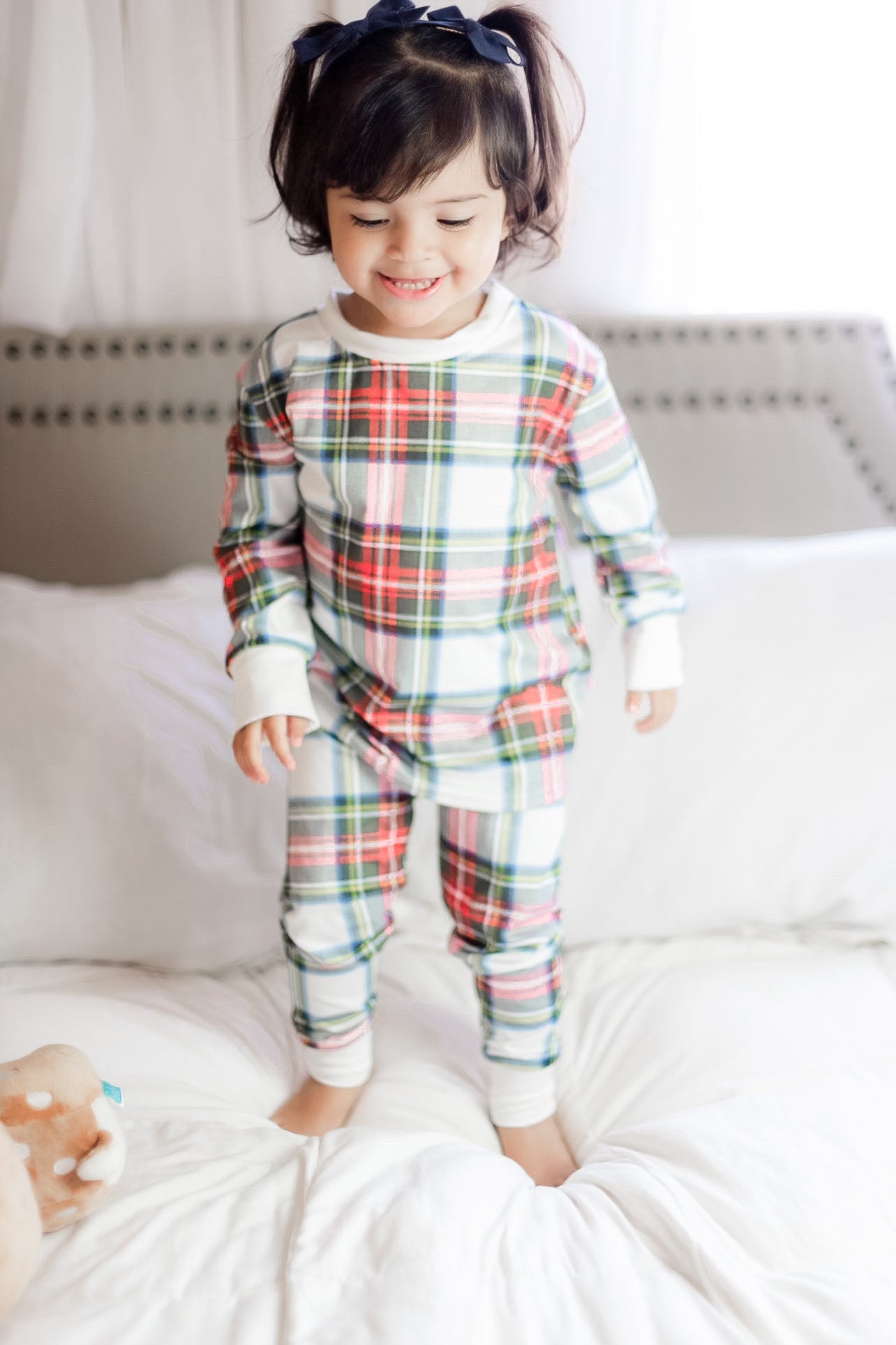 Young child wearing the 2 Pc Christmas Pajamas - Stuart Tartan Holiday Plaid