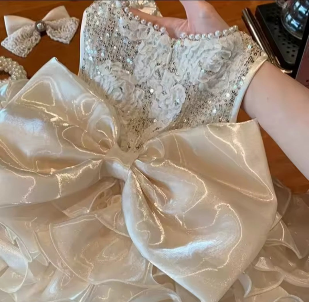 COMING SOON - Baby Girl Sequin Ruffle Pearlescent Dress with Bow