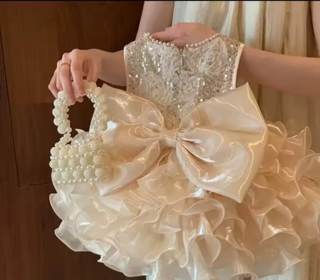 COMING SOON - Baby Girl Sequin Ruffle Pearlescent Dress with Bow