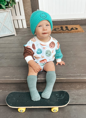 Theo & Me - Green Aqua Smiley Faces Ribbed Knit Hat