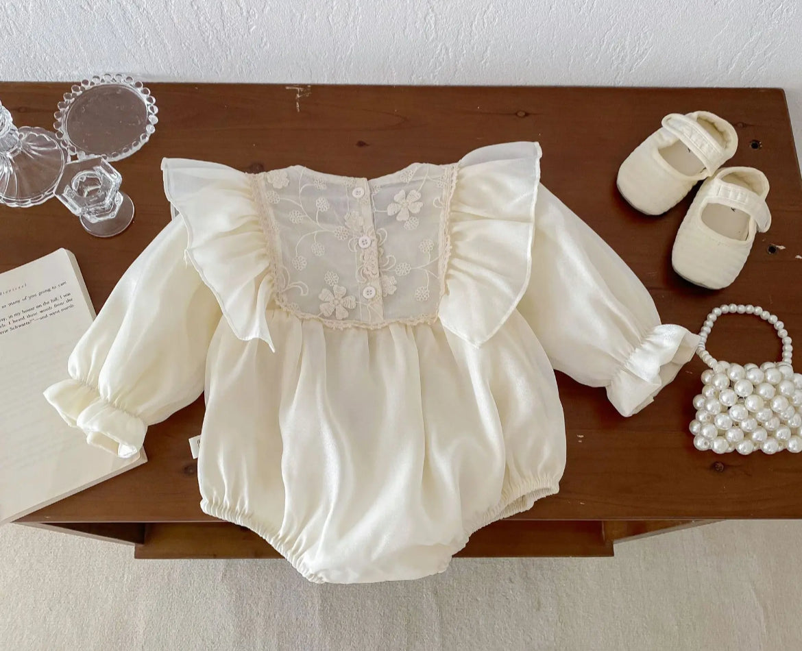 Baby Girls Romper - Ivory Ruffle with Lace Embroidered Bodice - showing back of outfit, showing buttons & lace on upper back