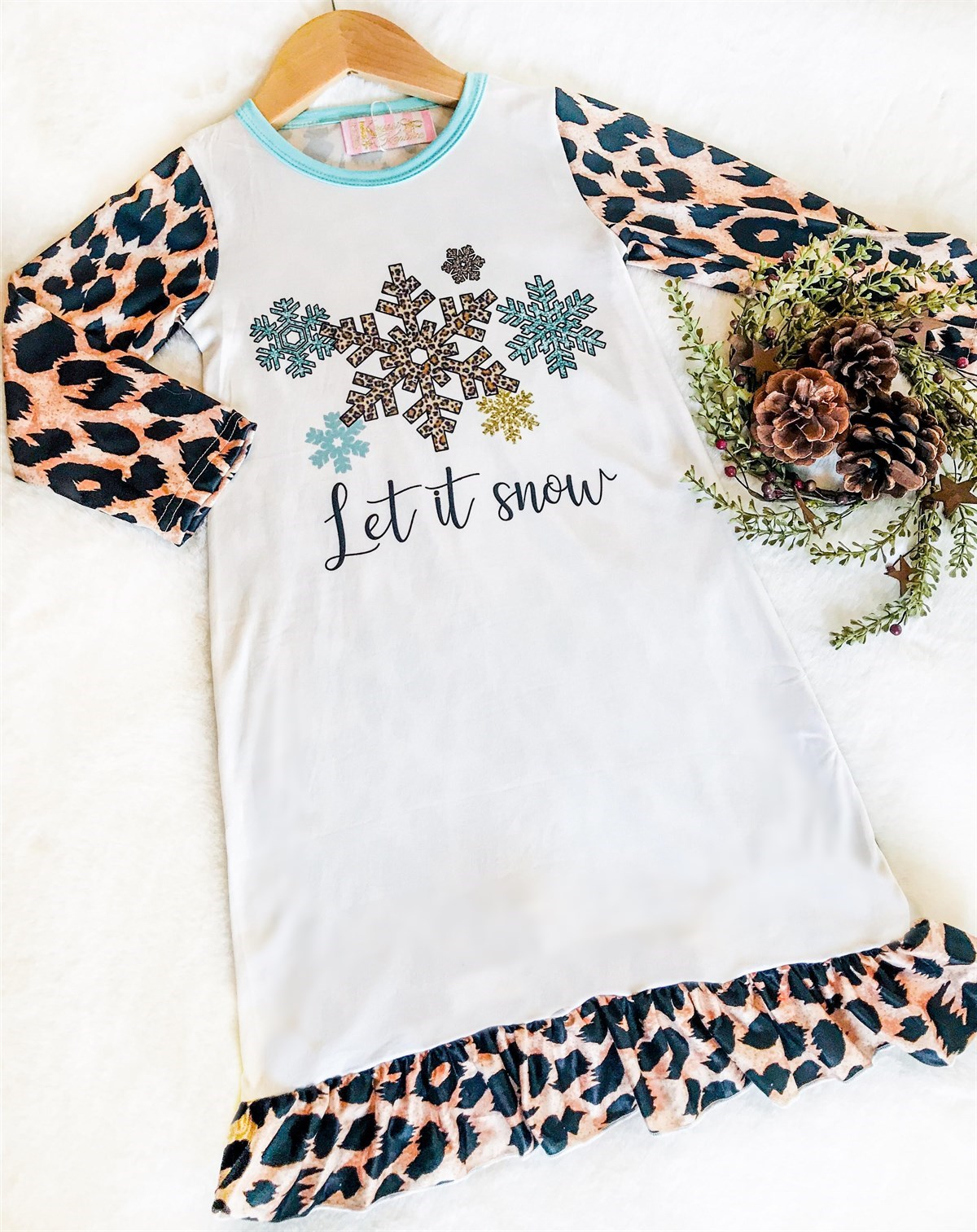 Girls Christmas Night Gowns - Leopard Let It Snow. Leopard sleeves & ruffle leopard detailing at the bottom. Snowflakes & the words Let it Snow are on the chest area.
