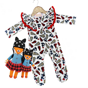 Kryssi Kouture Sienna Holiday Infant Deluxe Tutu Jumpsuit - Leopard Tree Pom. With leopard, black check, & buffalo plaid trees. The shoulder has the same pattern on the ruffles with red poms.