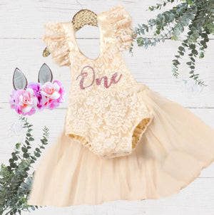First Birthday Beige Lace Tutu Romper 2 Pc Set with Pink One decal - includes matching floral headband.