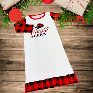 Girls Christmas Night Gowns - Cousin Crew Plaid. Buffalo Plaid sleeves and ruffle detailing on the bottom. Cousin Crew words with buffalo plaid decal on the chest.