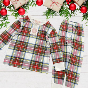 Ho-Ho-Home for the holidays? These adorable comfy holiday PJs are perfect for lounging around and having your Christmas photos taken. Flat lay of the Stuart Tartan Holiday Plaid 2 piece pajamas set.
